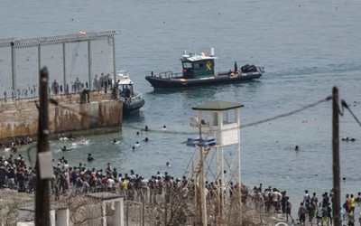 THE CHURCH OPENS ITS DOORS AS CEUTA COUNTS ITS DEAD